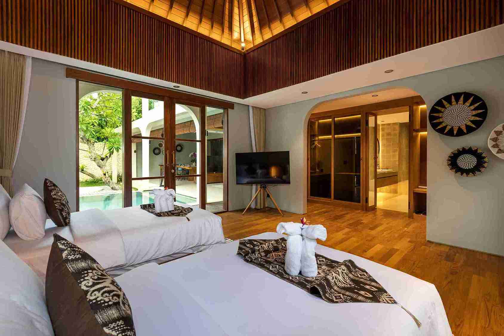 Our Garden Suites feature a king size bed, walk-in wardrobe, luxury bathroom and living area with bespoke work desk.